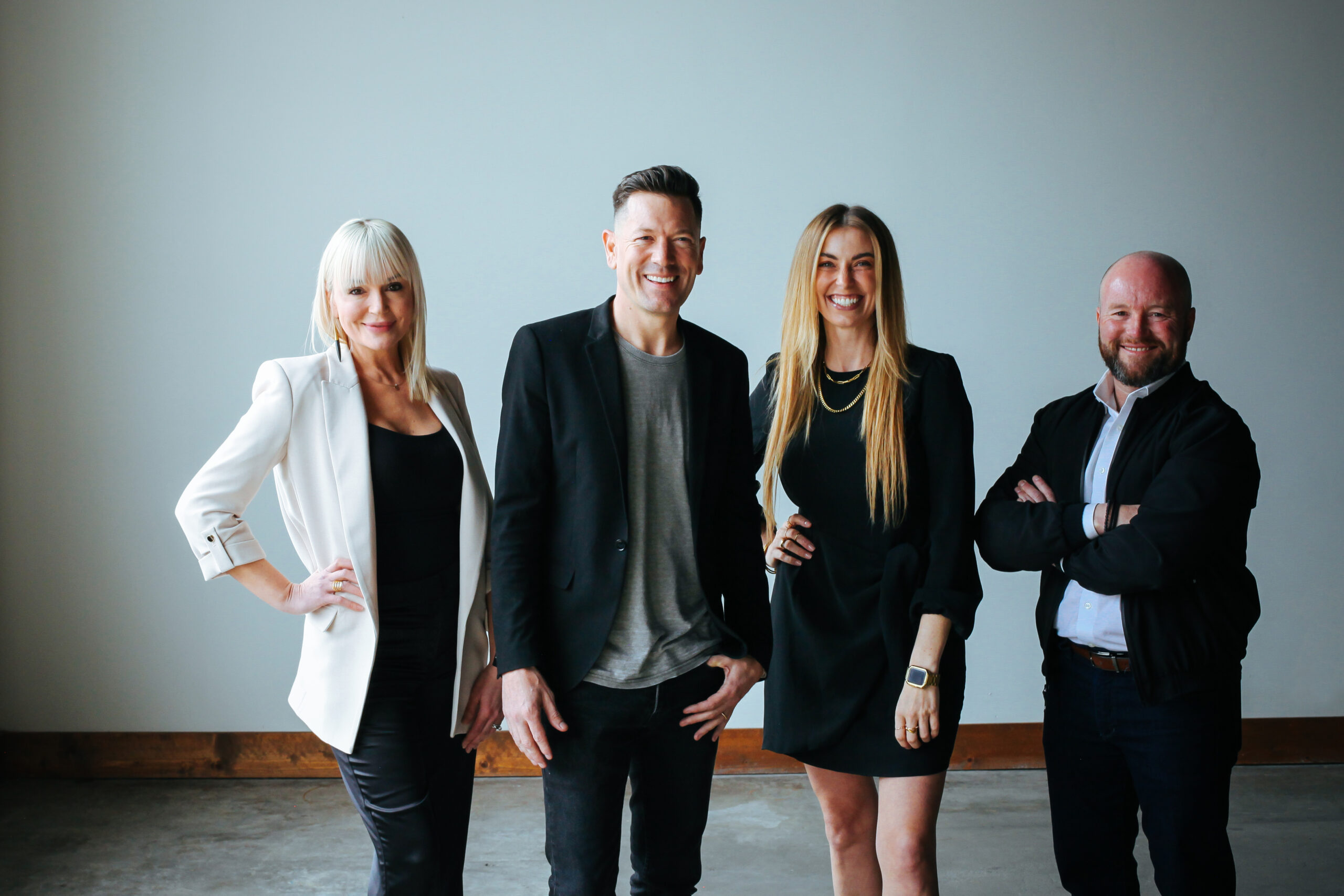 The Timber and Love Realty team: Jennifer Carr, Luke Caldwell, Mira DiMaggio, and Travis Bolen